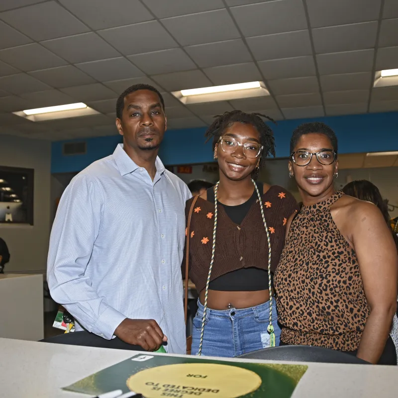 Family of 3 at First-Generation Graduation Celebration